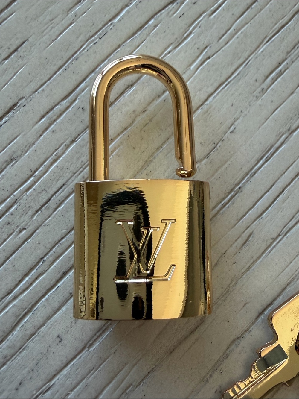 LV Gold Lock and Key Set - Picture 2 of 4